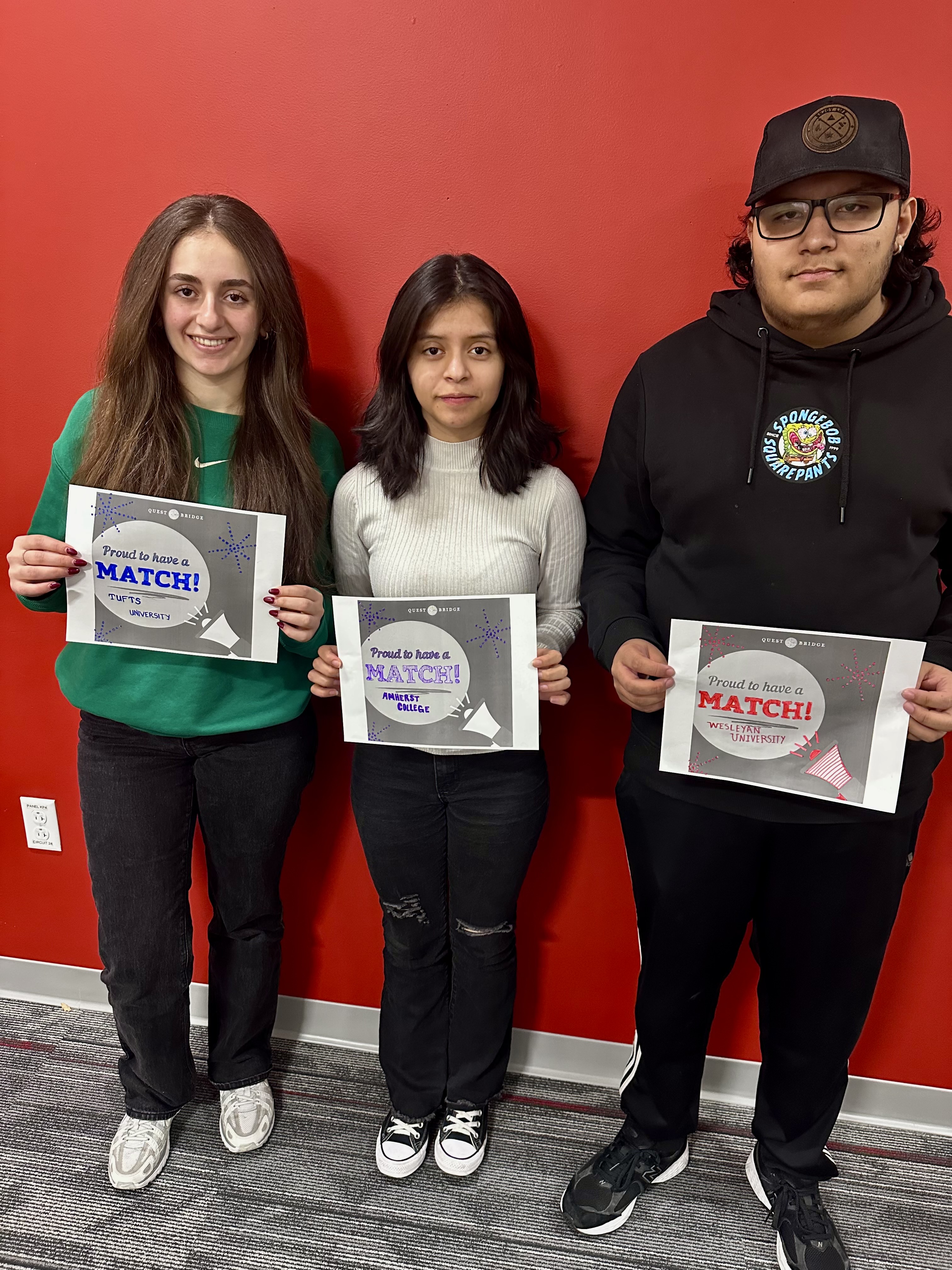 Three CHS seniors in the Class of 2025 pictured side-by-side holding up certificates recognizing their QuestBridge scholarship awards